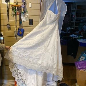 Wedding dress for sale, never worn. Selling for $300